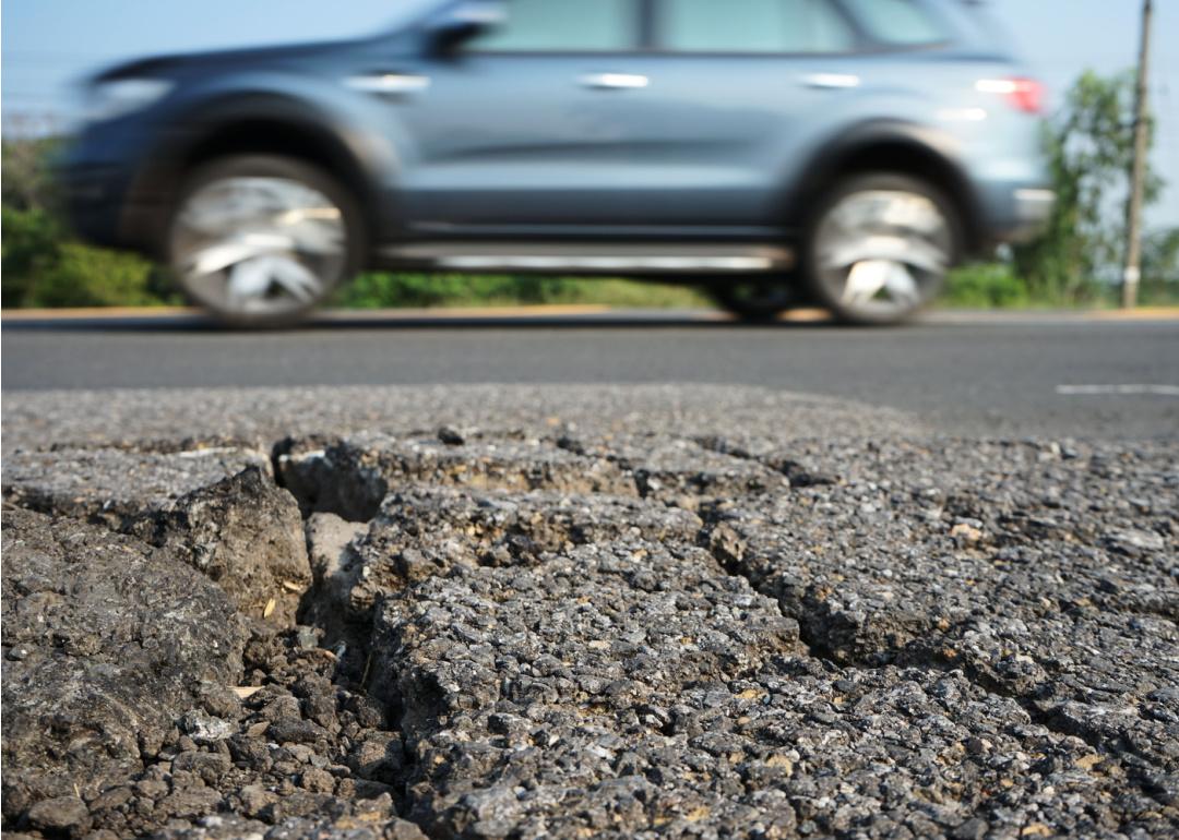 Close up on damaged road surface.