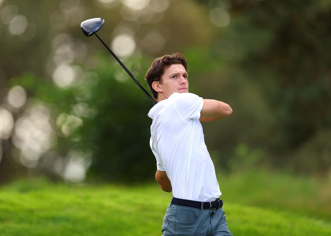 Tom Holland plays a shot during the Pro-Am prior to the BMW PGA Championship.