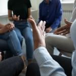 A group sitting in a circle.