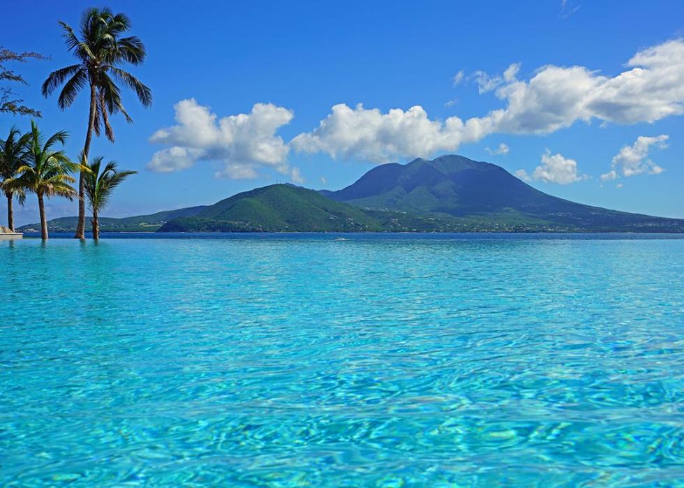 View of the Nevis Peak volcano from a swimming pool in St Kitts.