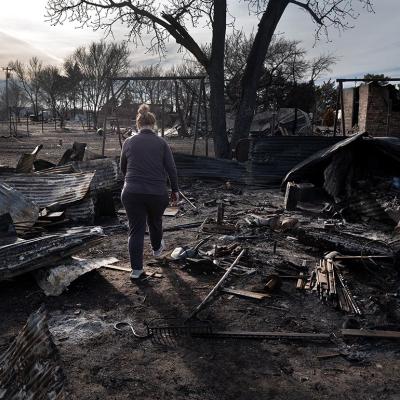 Angie Hodges searches for items in the remains of her home after it was destroyed by the Smokehouse Creek fire, which burned more than a million acres, on March 03, 2024 near Stinnett, Texas.