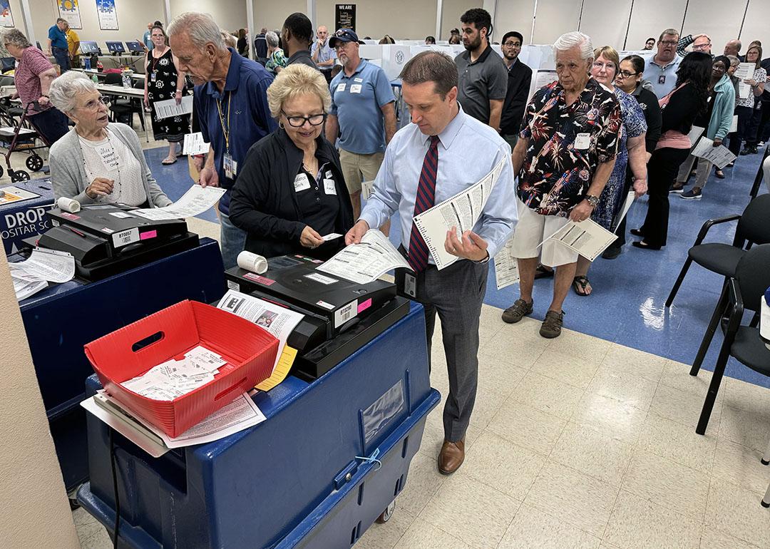 Maricopa County Elections Director Scott Jarrett casts a fake ballot during a mock election on May 29, 2024. 