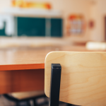 Desk in primary school classroom.