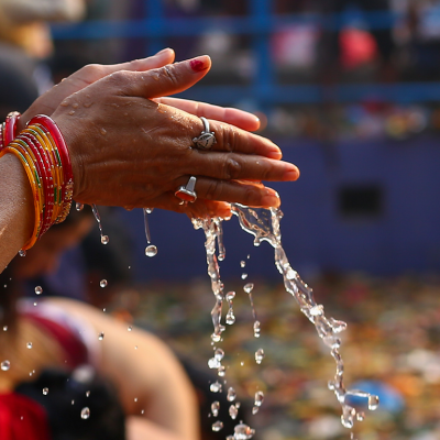 A Nepali Hindu offer prayers at Matatirthau.