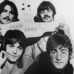 The Beatles hold a submarine during their announcement to make the animated film Yellow Submarine later released in 1968. From left to right: George Harrison (top left), Ringo Starr (top right), John Lennon (bottom right), and Paul McCartney (bottom right).